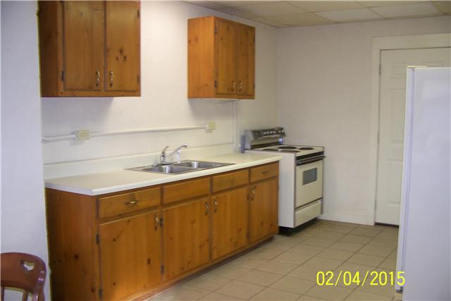 1062 Logue Road Mount Juliet, TN 37122 - Photo 15 of 20 a kitchen with a sink and cabinets