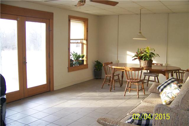 1062 Logue Road Mount Juliet, TN 37122 - Photo 16 of 20 a view of a dining room with furniture and a potted plant