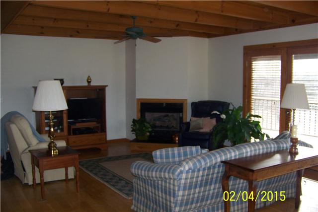 1062 Logue Road Mount Juliet, TN 37122 - Photo 4 of 20 a living room with furniture and a fireplace