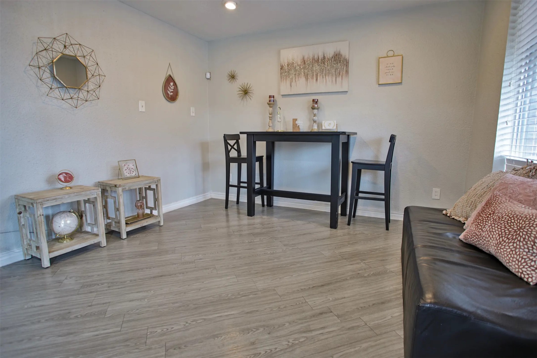 2700 South Dairy Ashford Road, Unit 628A Houston, TX 77082 - Photo 8 of 15 a living room with furniture and a wooden floor