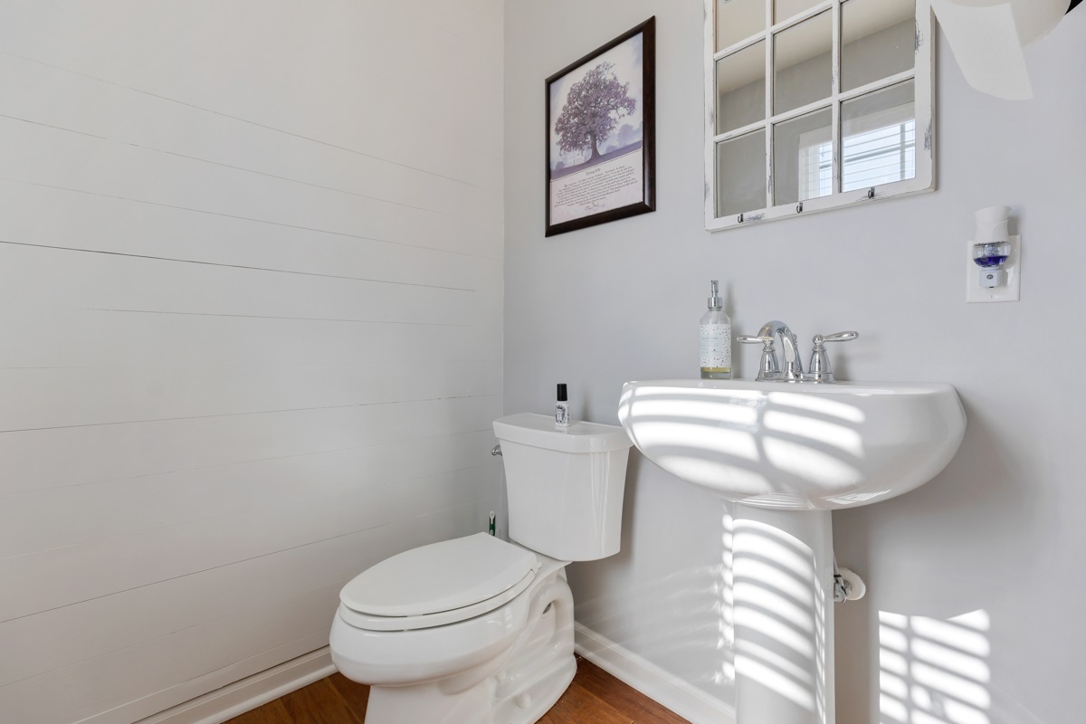 1430 Souders Avenue Elburn, IL 60119 - Photo 15 of 37 a bathroom with a toilet and a sink