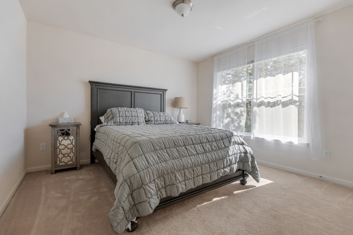 1430 Souders Avenue Elburn, IL 60119 - Photo 19 of 37 a bedroom with a bed and a window