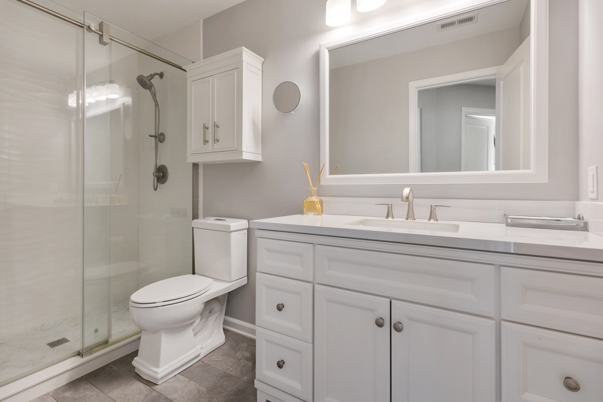 1430 Souders Avenue Elburn, IL 60119 - Photo 22 of 37 a bathroom with a sink toilet and shower