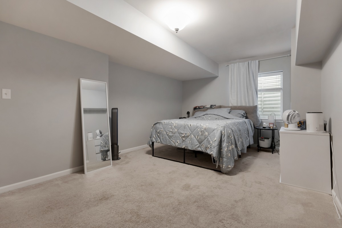 1430 Souders Avenue Elburn, IL 60119 - Photo 27 of 37 a bedroom with a bed and a couch