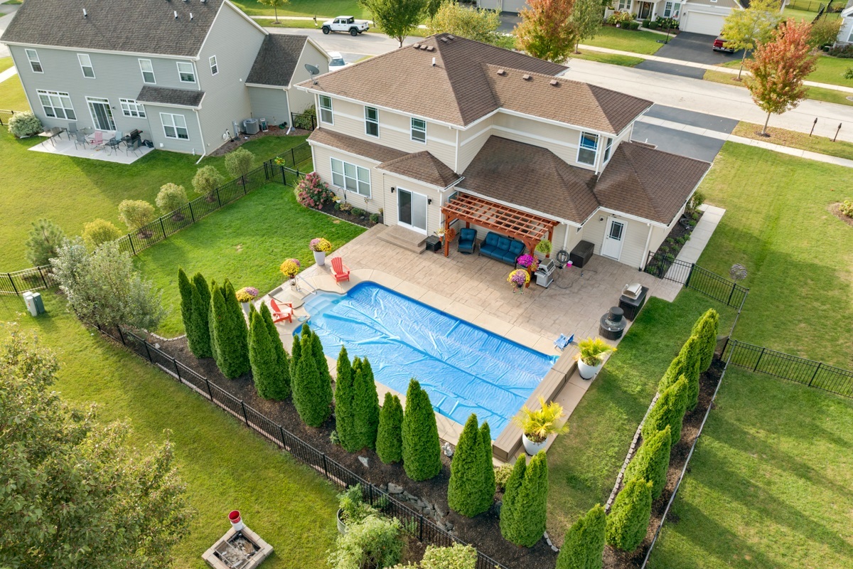 1430 Souders Avenue Elburn, IL 60119 - Photo 34 of 37 an aerial view of residential houses with outdoor space and swimming pool