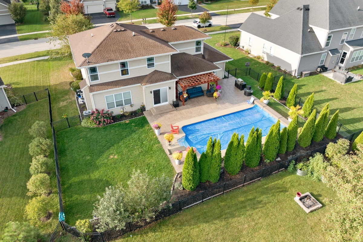 1430 Souders Avenue Elburn, IL 60119 - Photo 36 of 37 an aerial view of residential houses with outdoor space and trees