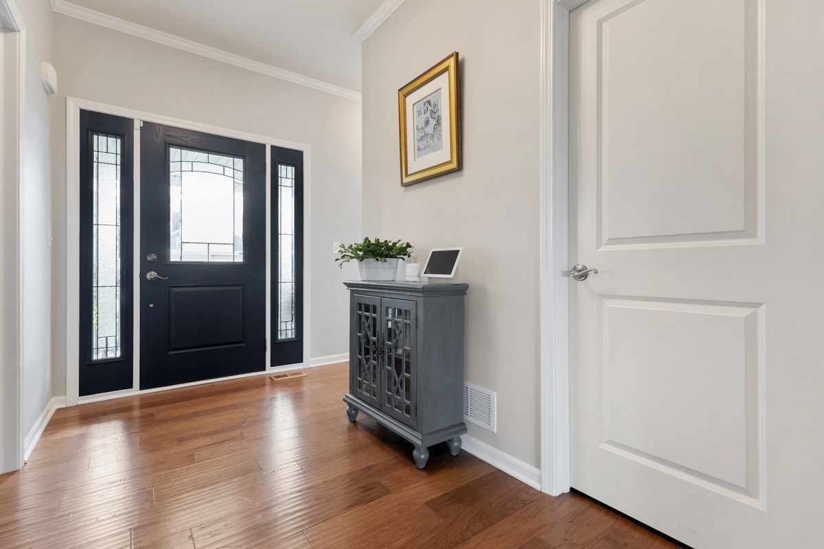 1430 Souders Avenue Elburn, IL 60119 - Photo 4 of 37 a view of an entryway with wooden floor