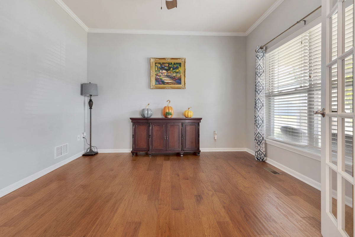 1430 Souders Avenue Elburn, IL 60119 - Photo 6 of 37 a view of a room with wooden floor and window
