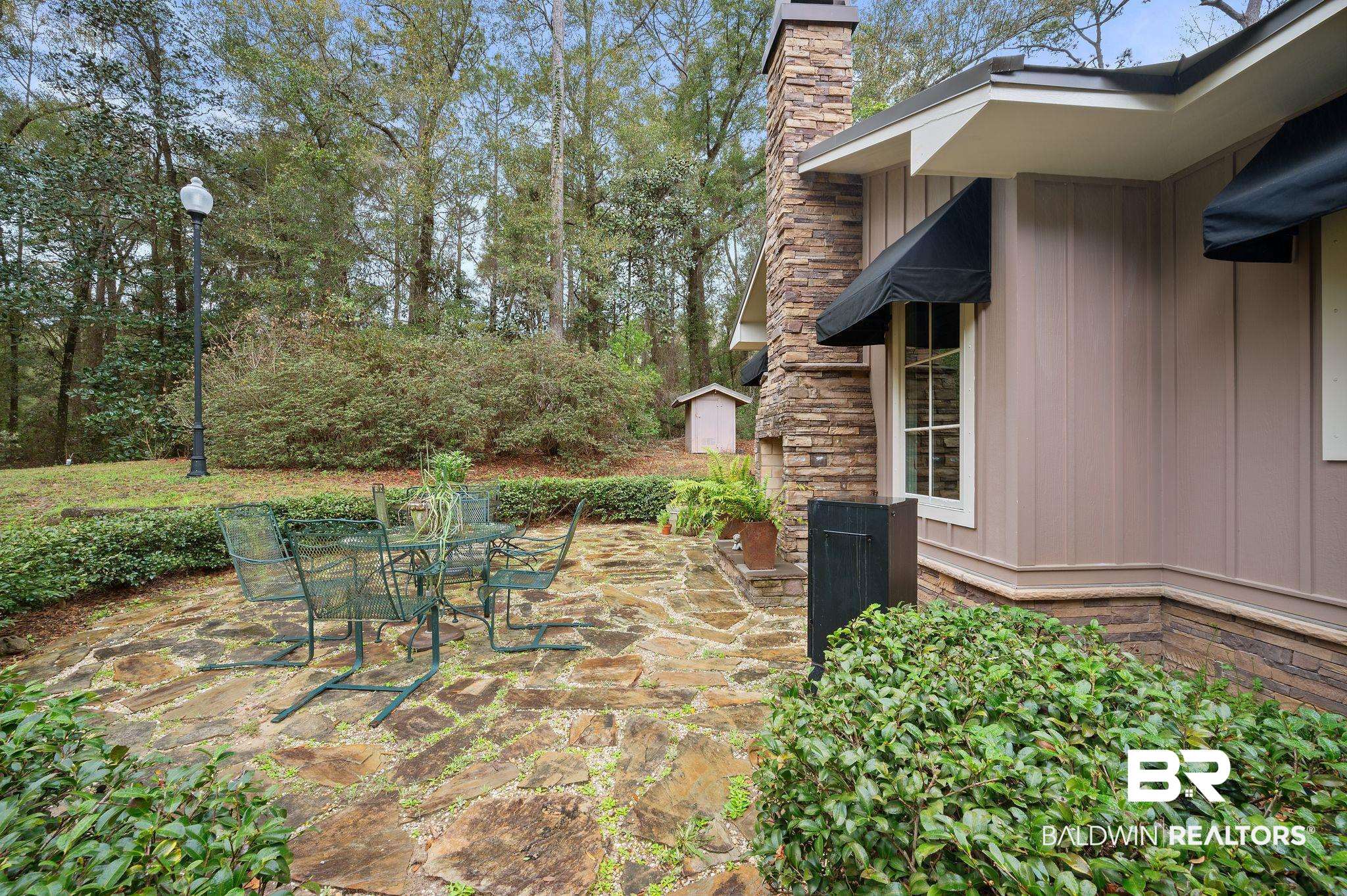 7850 Yorkhaven Road Mobile, AL 36695 - Photo 6 of 57 View of patio featuring outdoor dining space