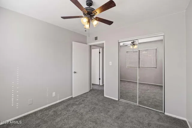 a view of a table and chair in the patio