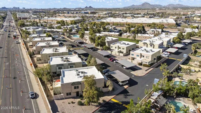 an aerial view of residential building and parking space