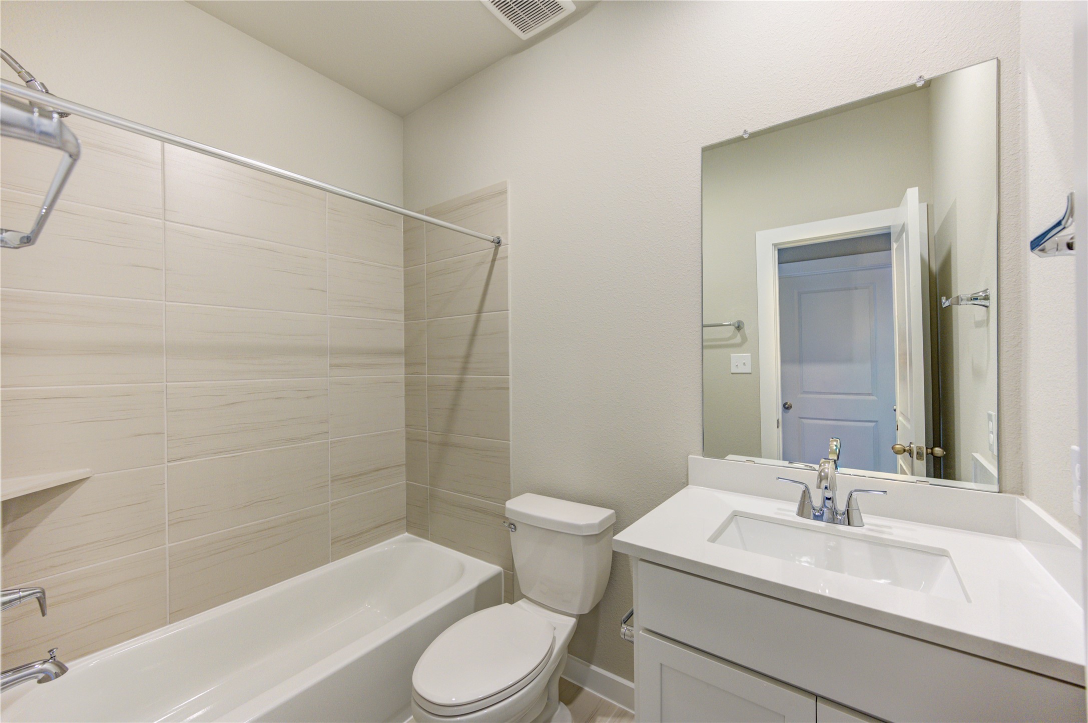 6219 Lost Rdg Lane Richmond, TX 77469 - Photo 16 of 50 a bathroom with a sink a toilet and a bathtub