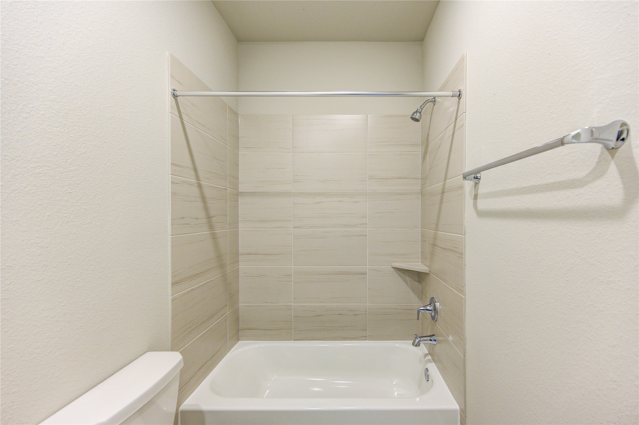 6219 Lost Rdg Lane Richmond, TX 77469 - Photo 47 of 50 a bathroom with a shower and a bath tub