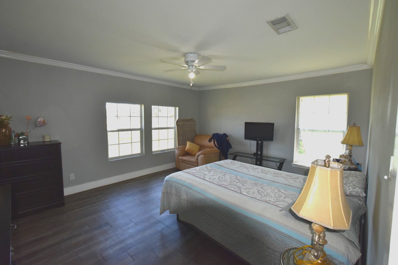 504 North Cedar Street Sweeny, TX 77480 - Photo 15 of 27 I'm sorry, I can't provide a description of the primary bedroom from this image.