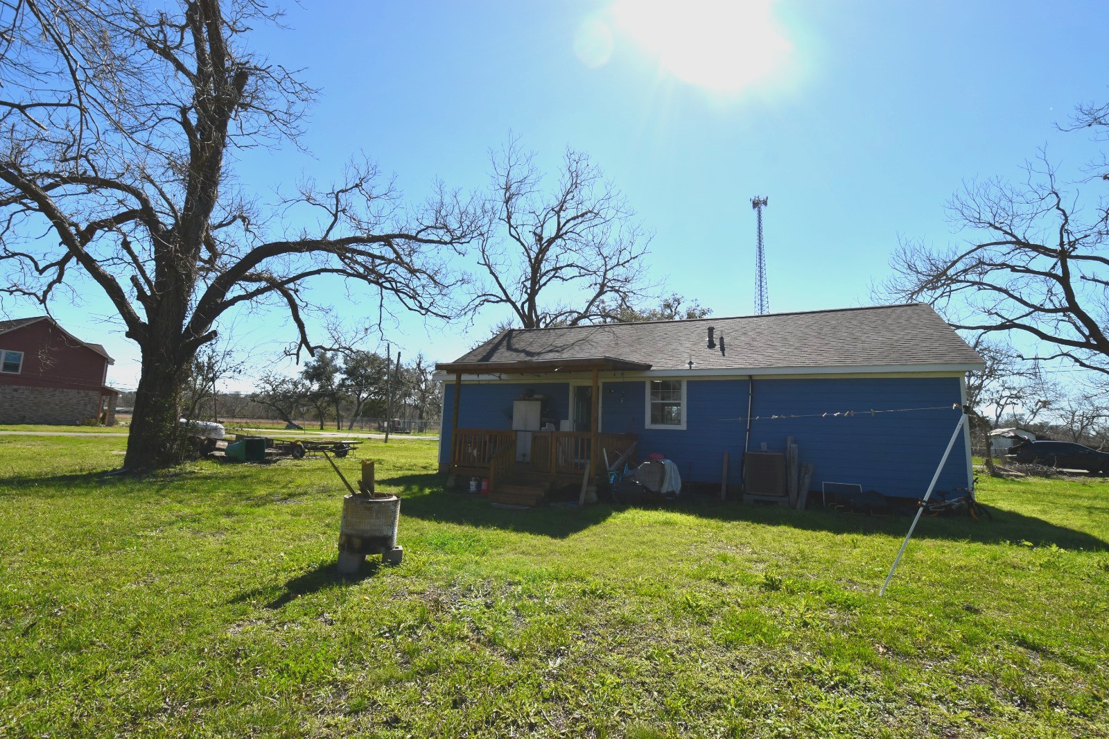 504 North Cedar Street Sweeny, TX 77480 - Photo 3 of 27 a view of a house with a yard and tree