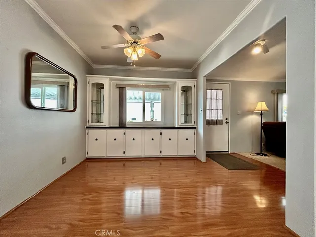 a view of a storage and utility room with washer and dryer