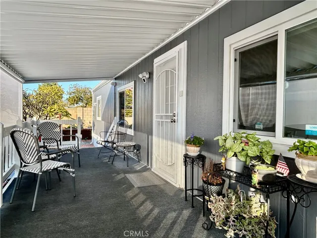 a outdoor living space with furniture and garden view