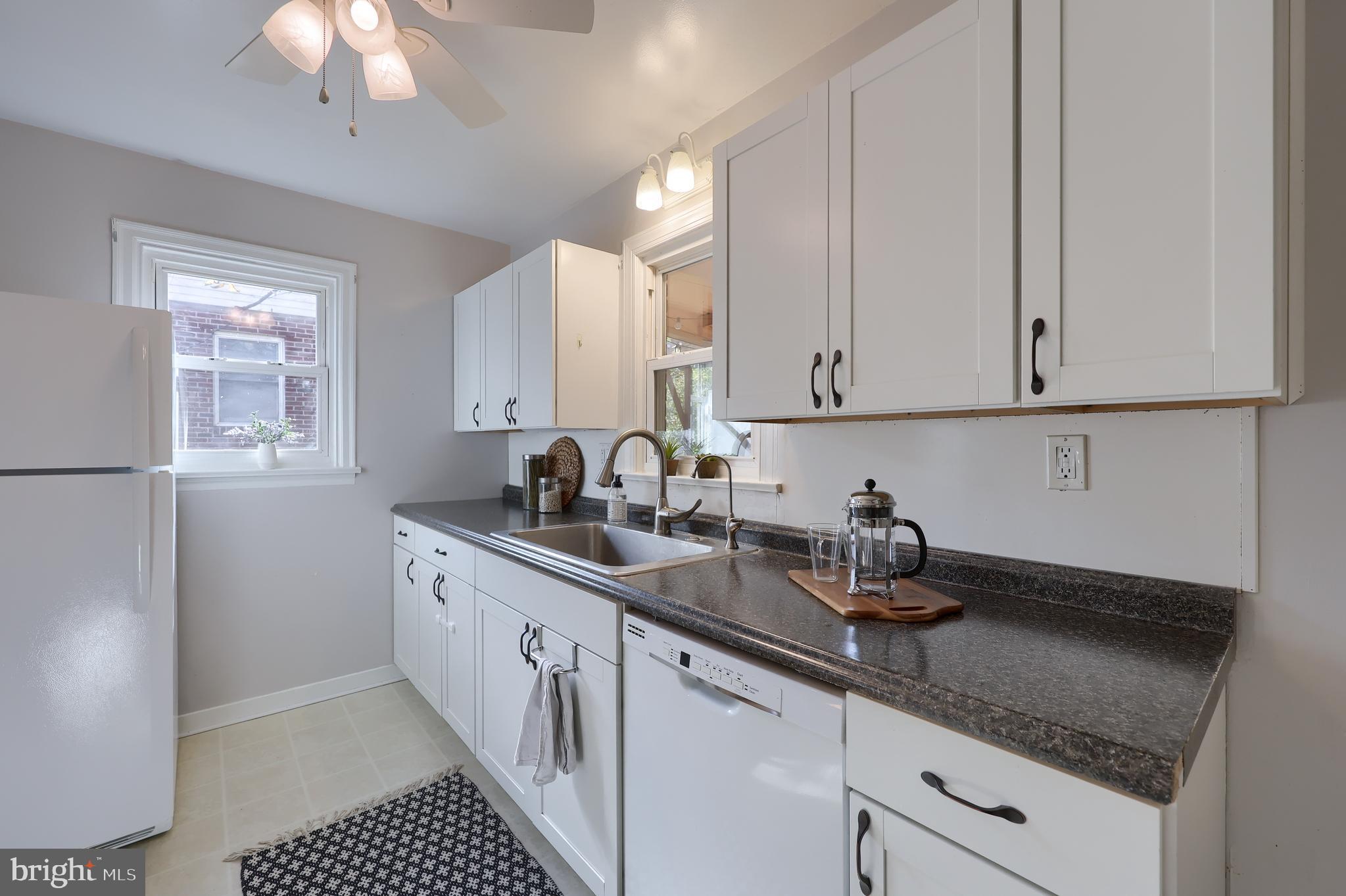 20 Willis Lane Lancaster, PA 17602 - Photo 13 of 39 a kitchen with stainless steel appliances granite countertop a sink a stove and a granite counter tops