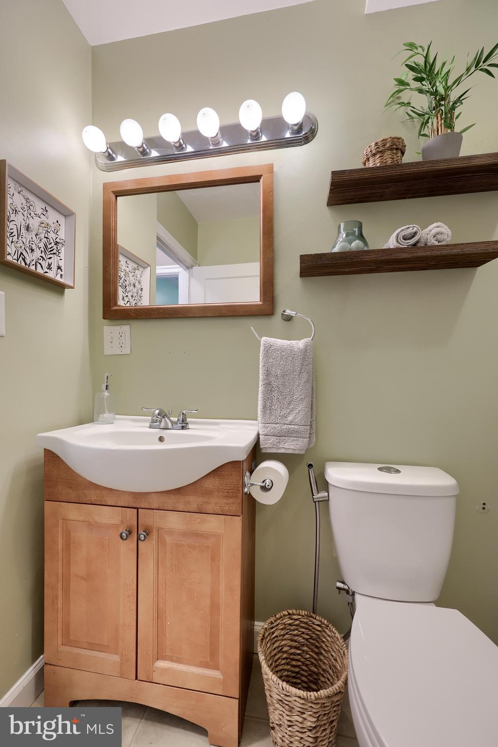 20 Willis Lane Lancaster, PA 17602 - Photo 18 of 39 a bathroom with a toilet a sink and mirror