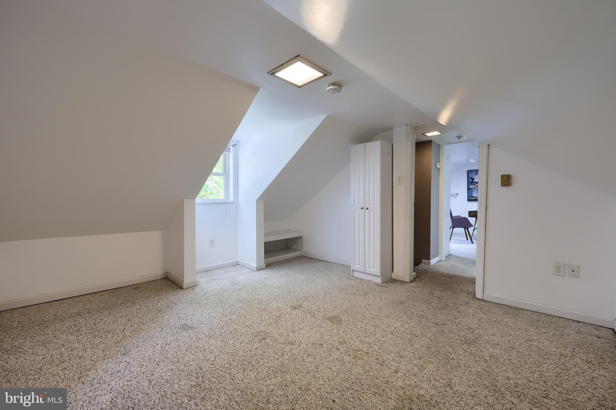 20 Willis Lane Lancaster, PA 17602 - Photo 24 of 39 an empty room with a kitchen and entryway