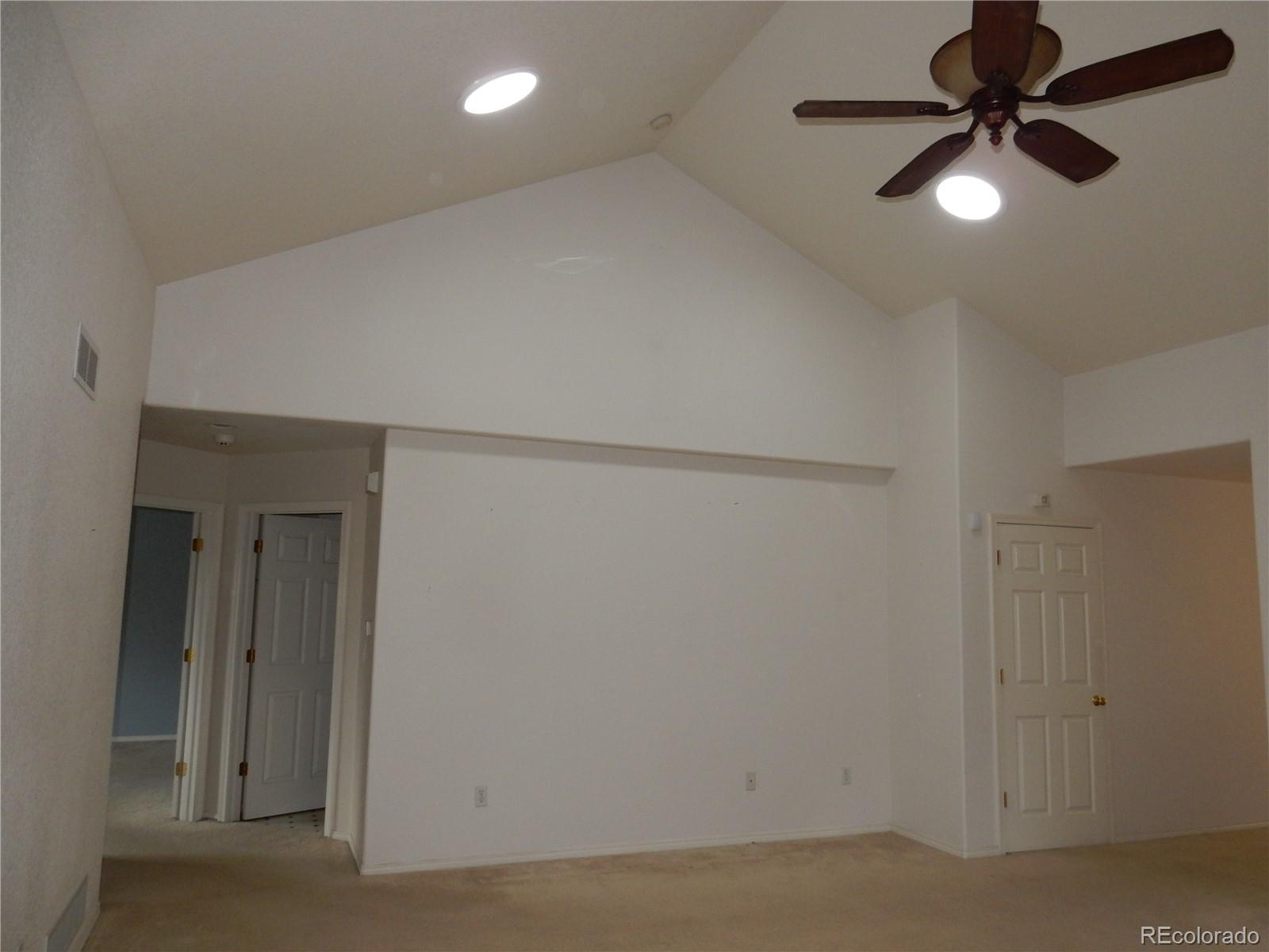 4324 Quail Street Wheat Ridge, CO 80033 - Photo 12 of 30 wooden floor in an empty room