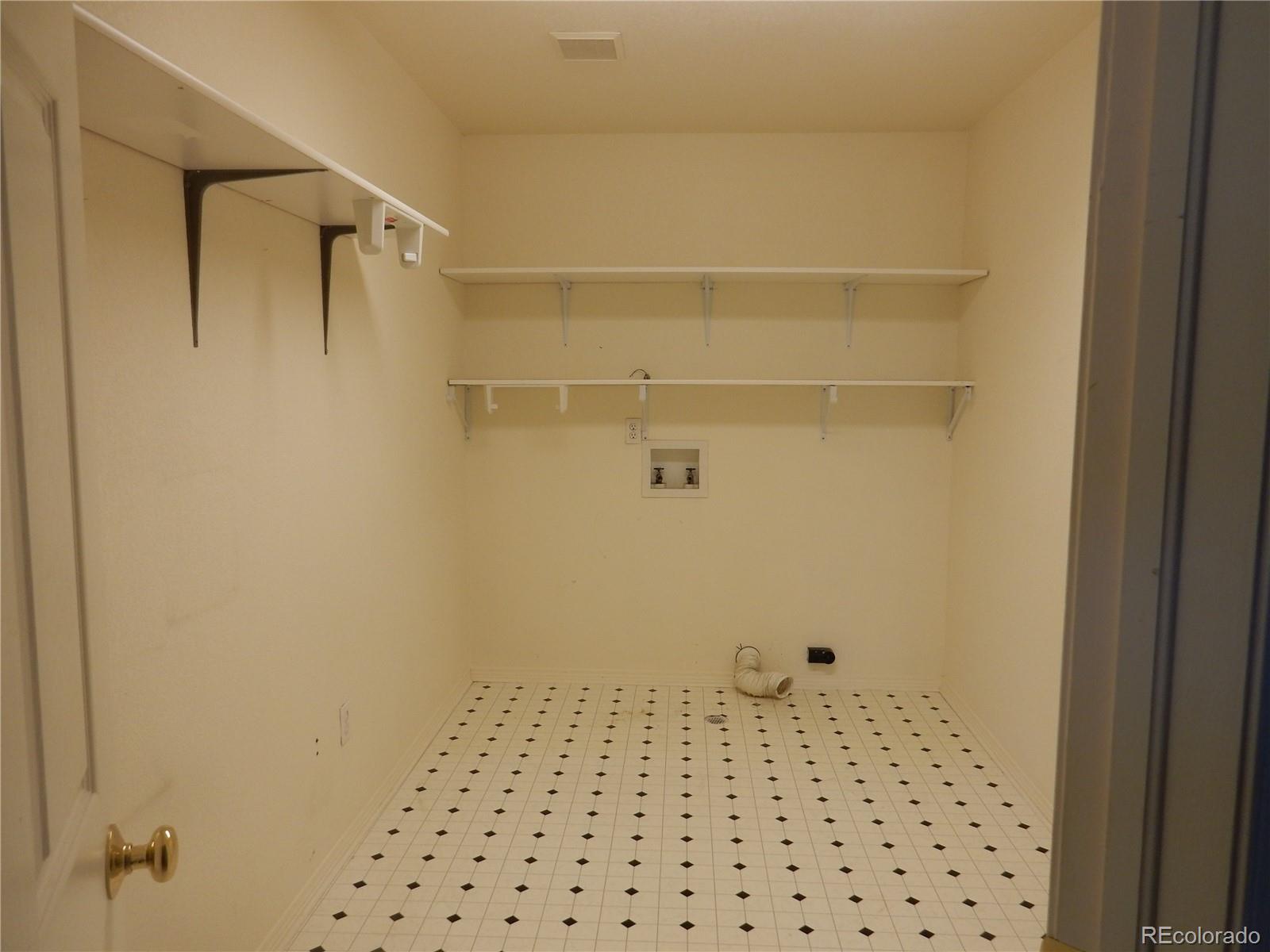 4324 Quail Street Wheat Ridge, CO 80033 - Photo 20 of 30 a bathroom with a shower and a sink