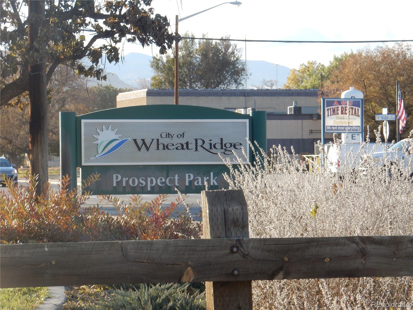 4324 Quail Street Wheat Ridge, CO 80033 - Photo 23 of 30 a view of a street with a street sign
