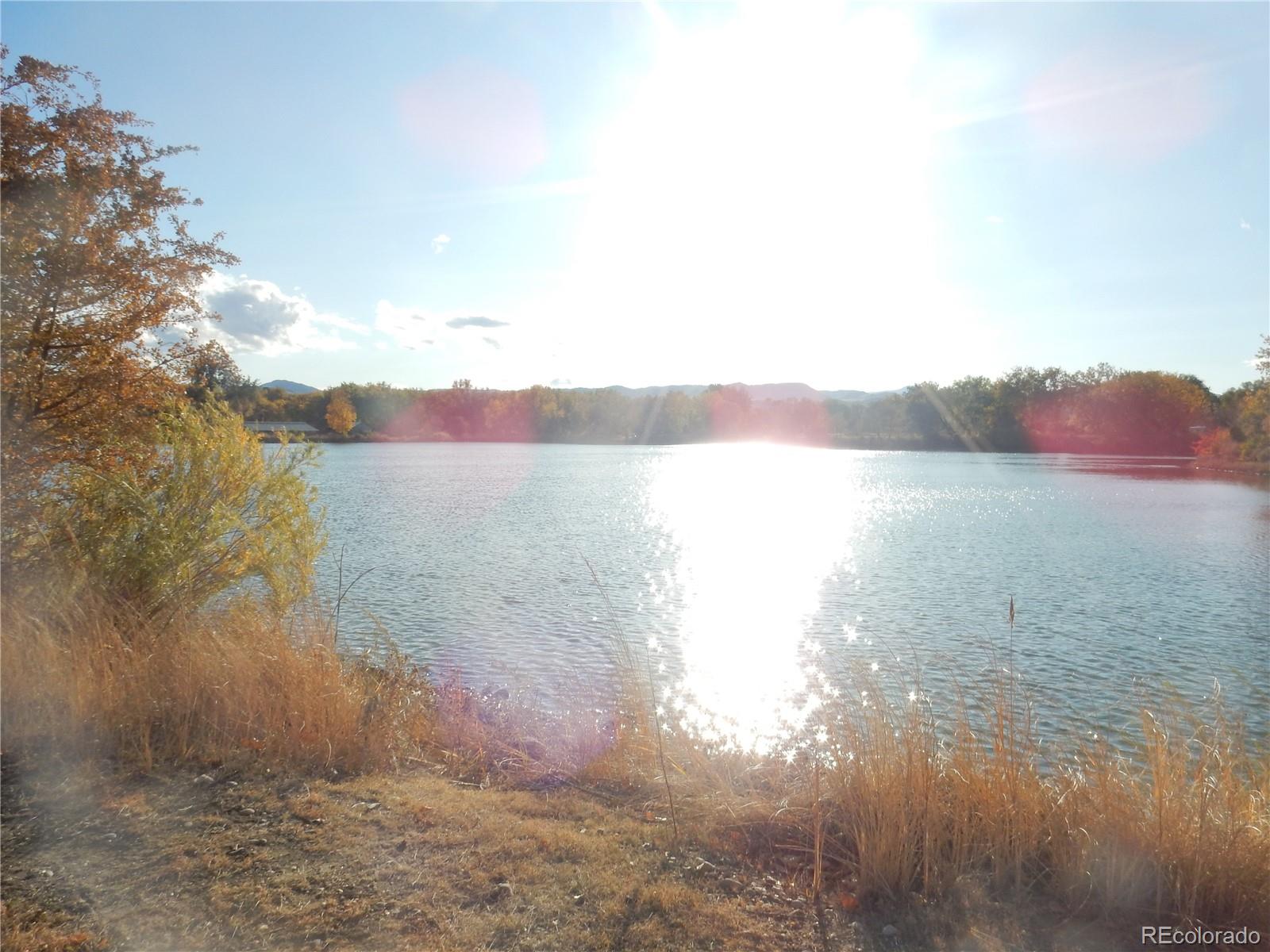 4324 Quail Street Wheat Ridge, CO 80033 - Photo 29 of 30 a view of lake with mountain
