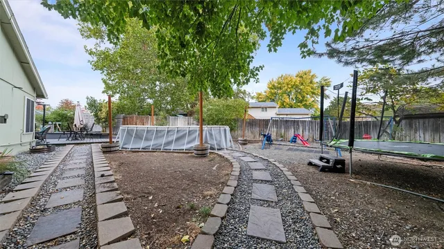 a view of a street with sitting area