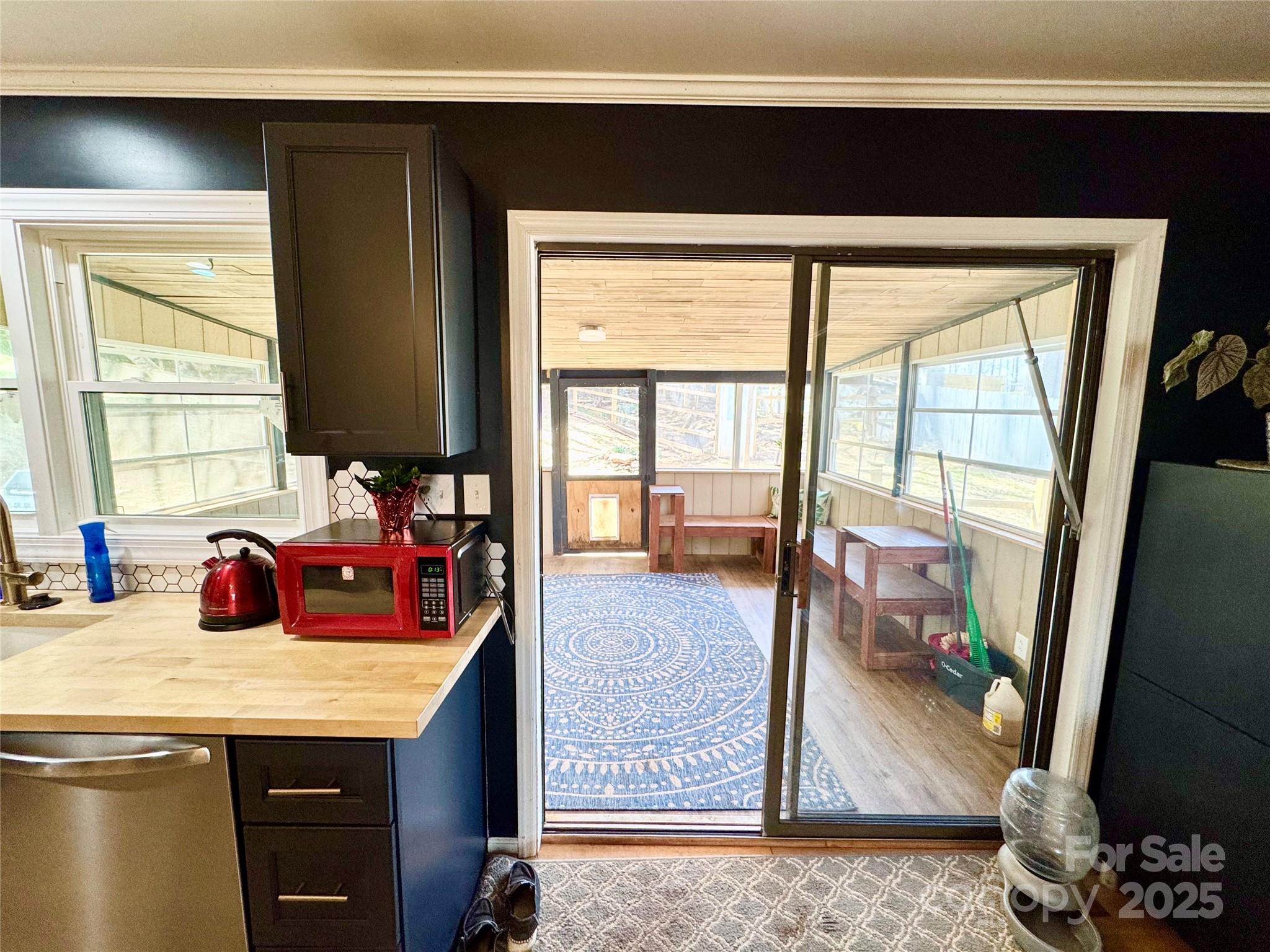 1 Spring Valley Drive Arden, NC 28704 - Photo 12 of 39 a view of a kitchen area with furniture and a window