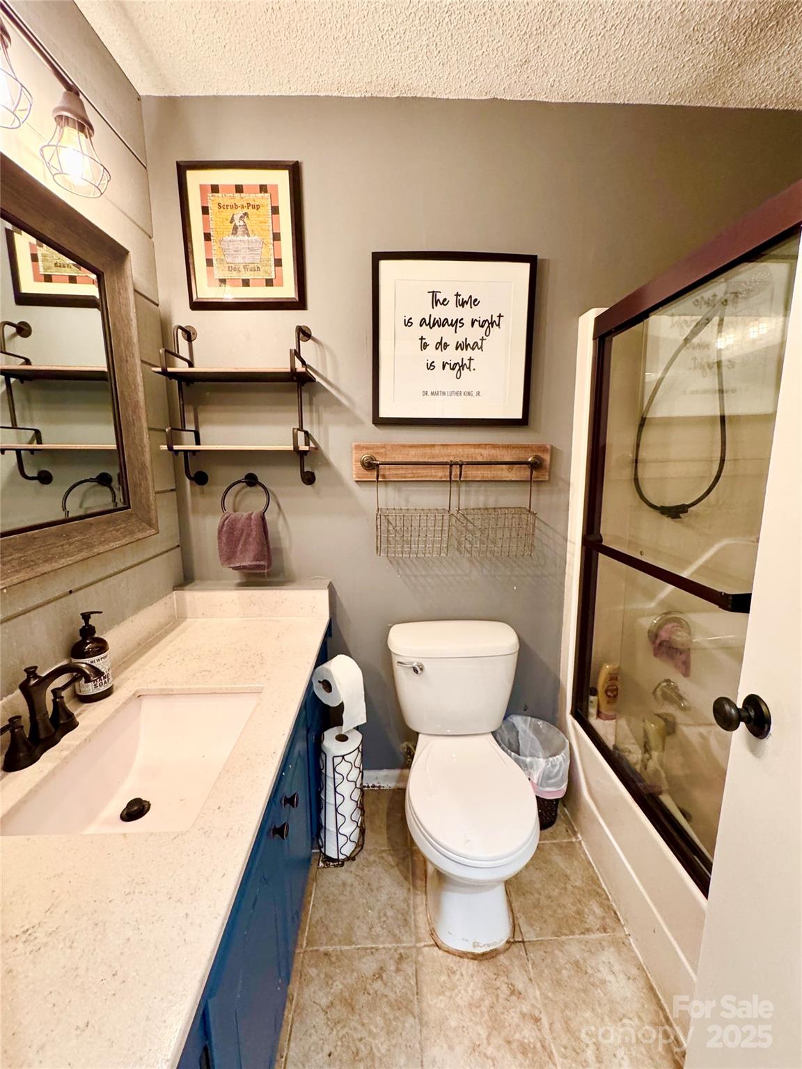 1 Spring Valley Drive Arden, NC 28704 - Photo 15 of 39 a bathroom with a toilet sink and mirror