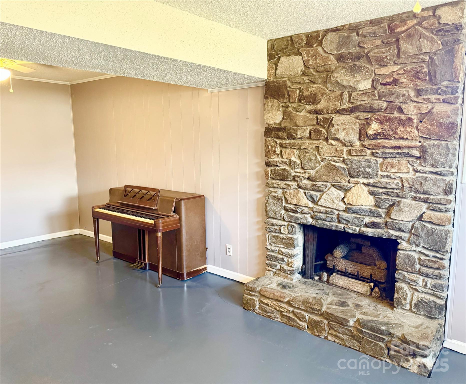 1 Spring Valley Drive Arden, NC 28704 - Photo 23 of 39 a room with a fireplace and a walk in closet