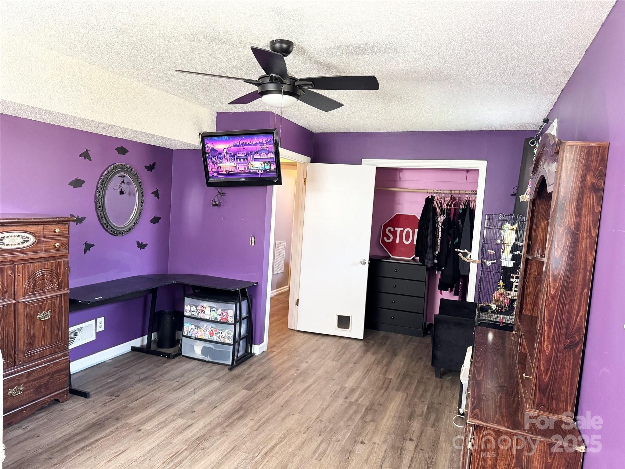 1 Spring Valley Drive Arden, NC 28704 - Photo 28 of 39 a view of a livingroom with furniture and a ceiling fan