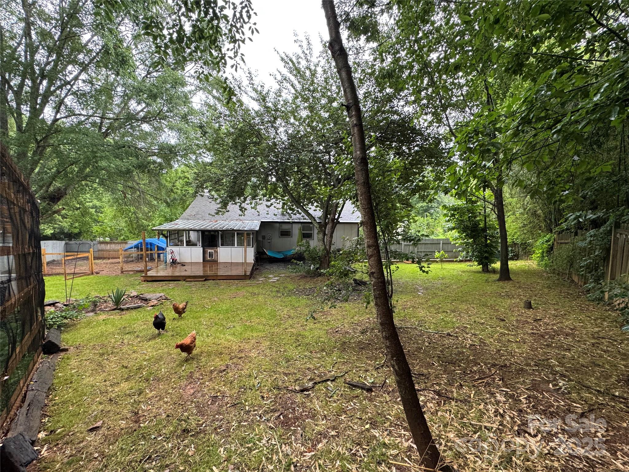 1 Spring Valley Drive Arden, NC 28704 - Photo 39 of 39 a house with trees in the background
