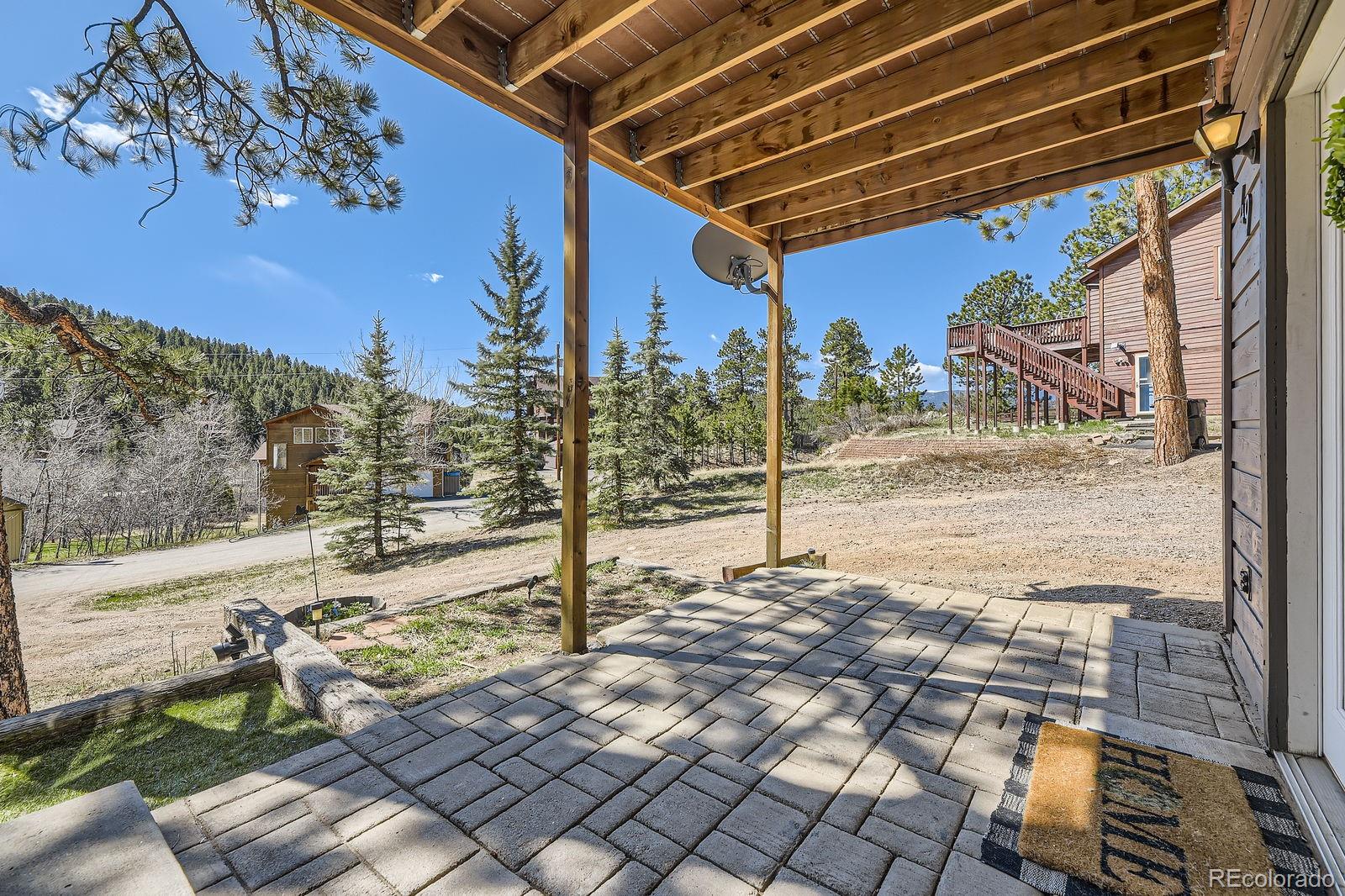 49 Silver Springs Road Bailey, CO 80421 - Photo 27 of 34 a view of a porch