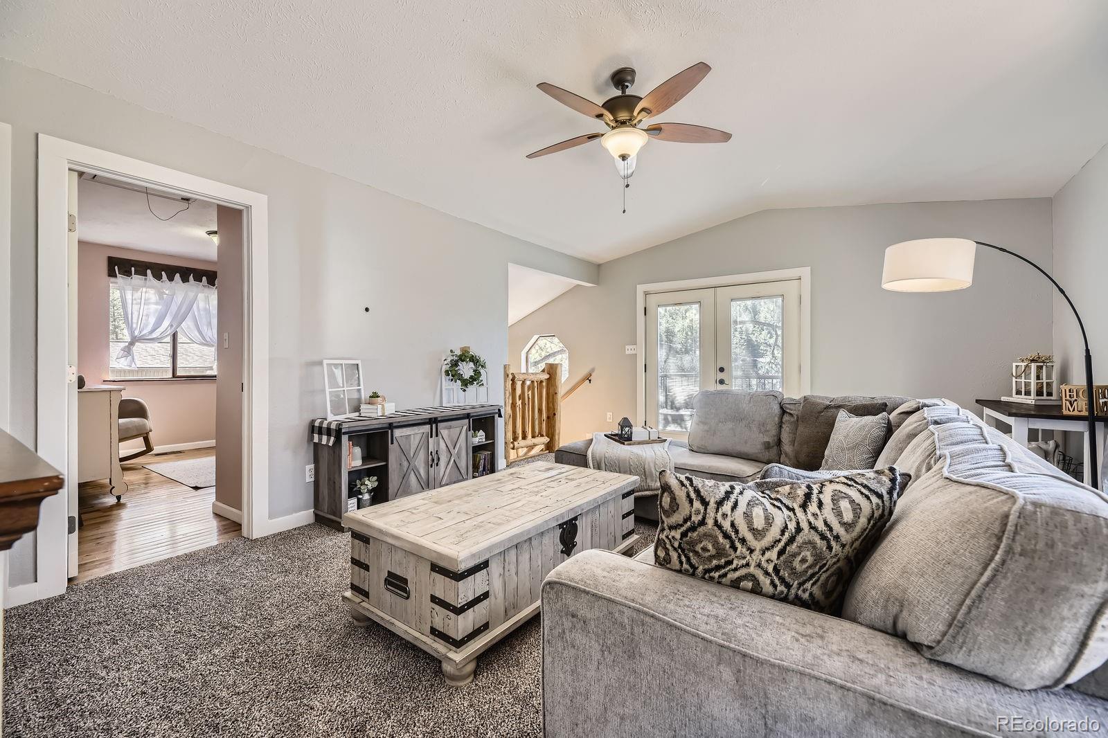49 Silver Springs Road Bailey, CO 80421 - Photo 8 of 34 a living room with furniture