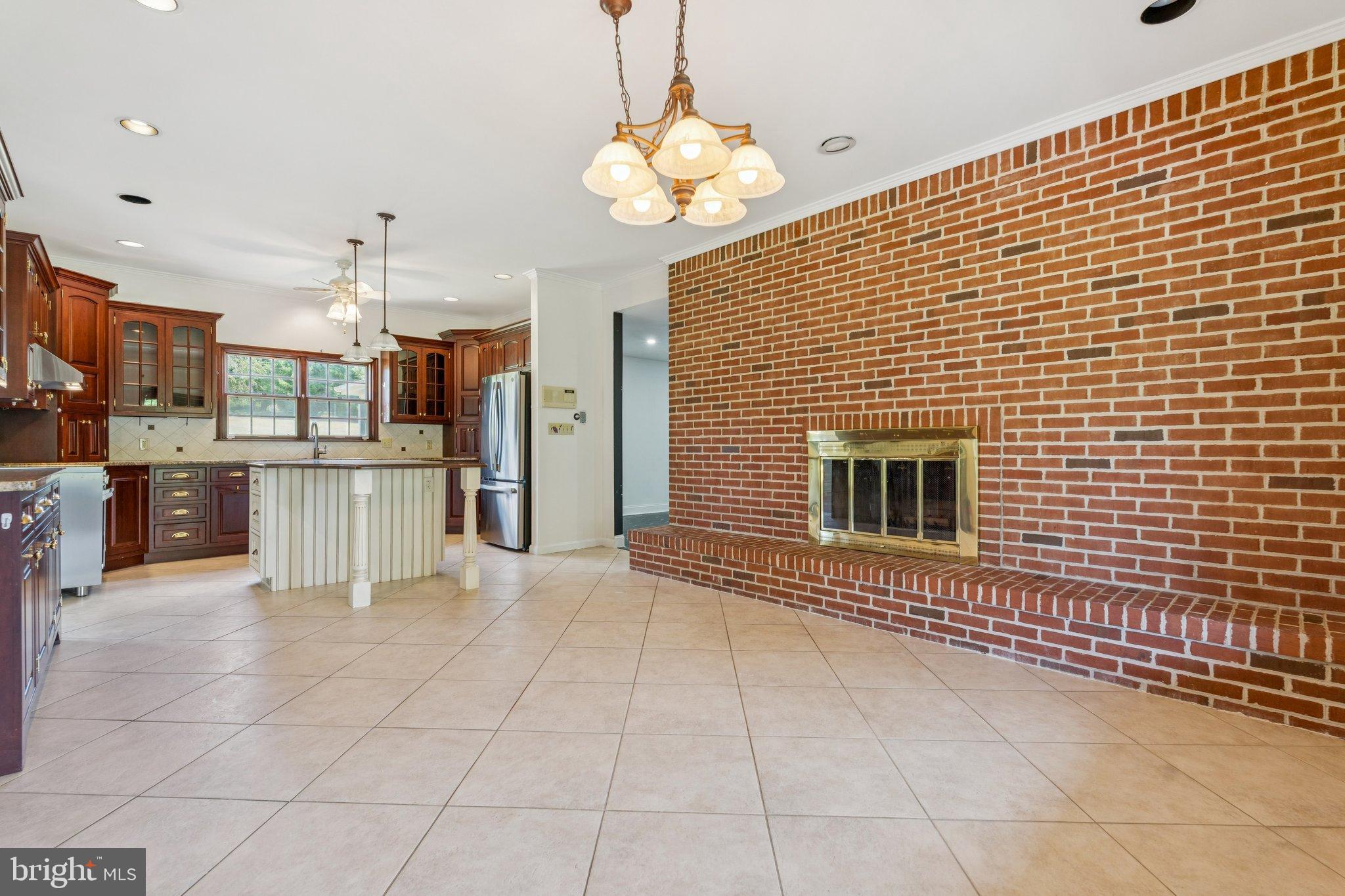 12212 Mt Albert Road Ellicott City, MD 21042 - Photo 15 of 58 a view of a kitchen with a sink