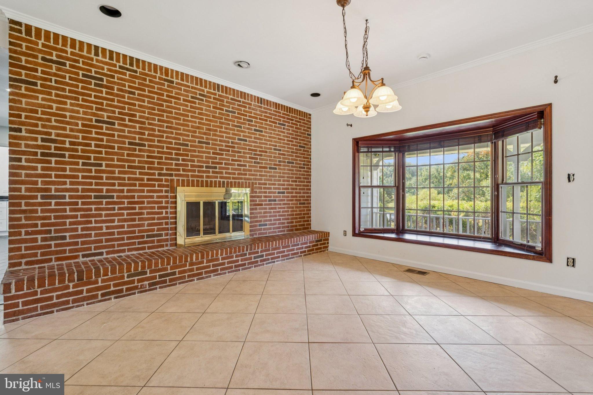 12212 Mt Albert Road Ellicott City, MD 21042 - Photo 19 of 58 a view of an empty room with a window