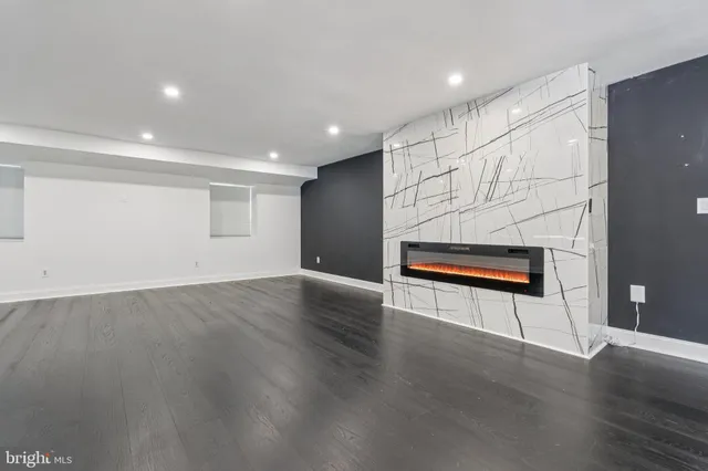 a bath room with a sink and a toilet