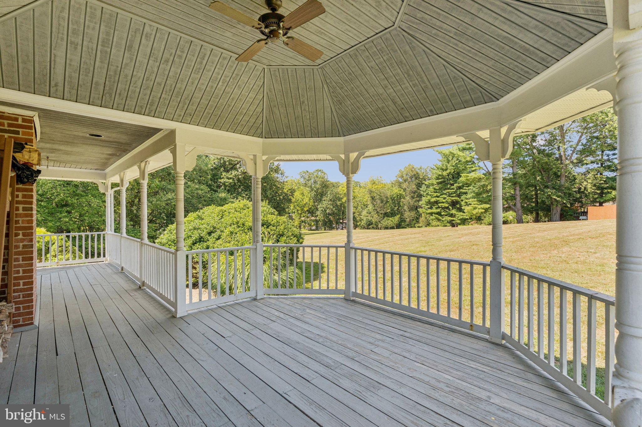 12212 Mt Albert Road Ellicott City, MD 21042 - Photo 45 of 58 Charming wraparound porch with scenic views.