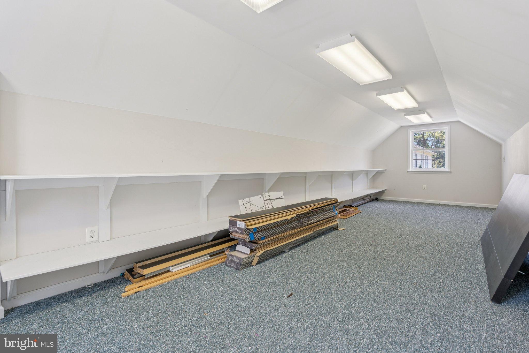 12212 Mt Albert Road Ellicott City, MD 21042 - Photo 50 of 58 a room with a wooden floor and white walls