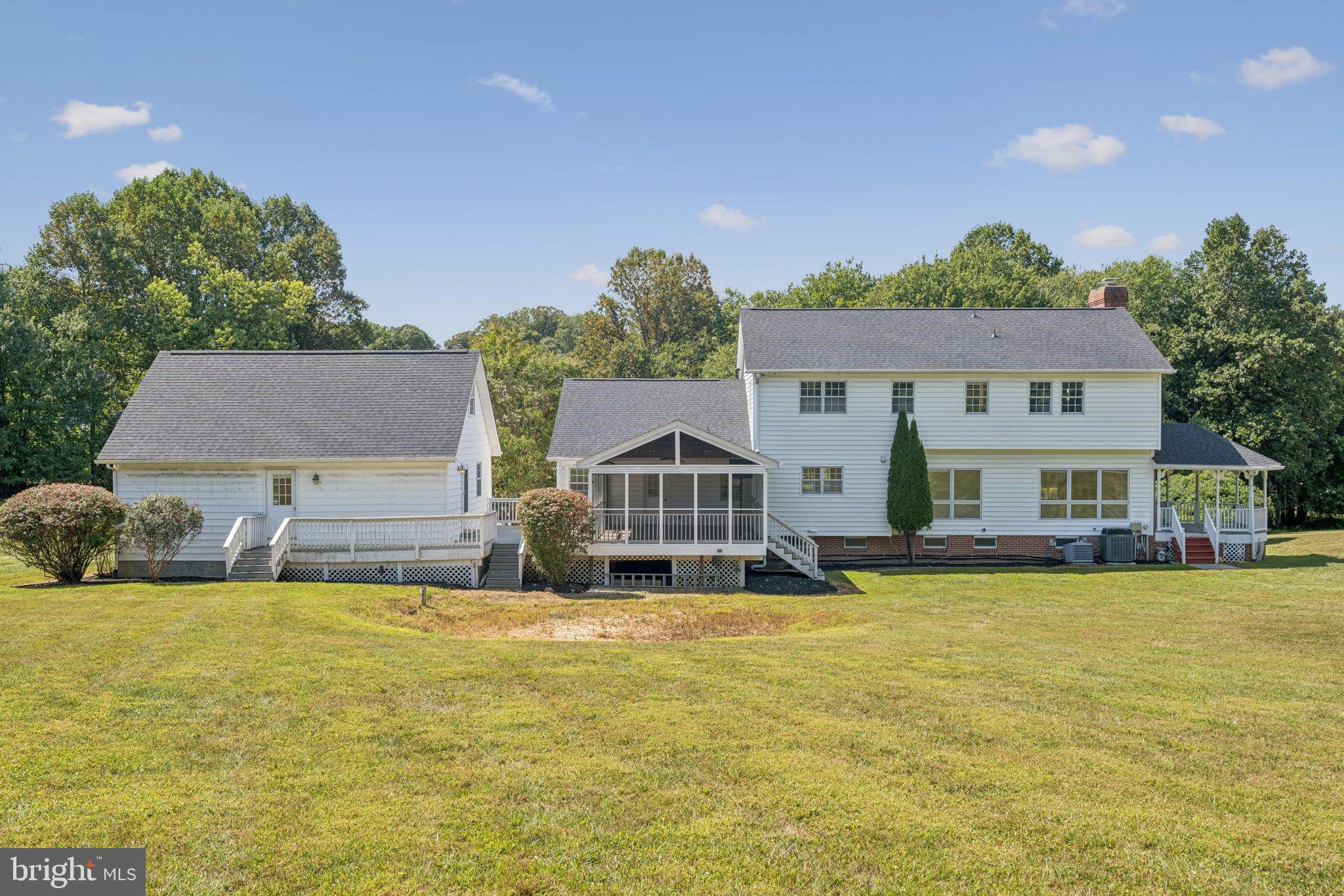 12212 Mt Albert Road Ellicott City, MD 21042 - Photo 52 of 58 a front view of a house with a yard