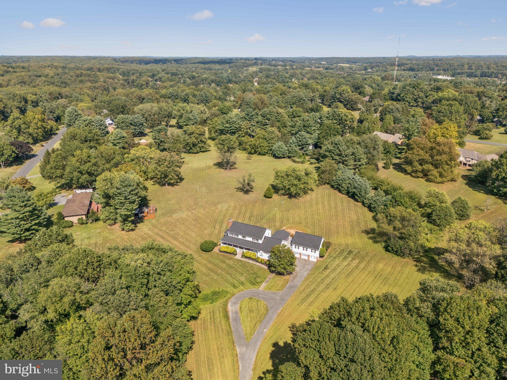 12212 Mt Albert Road Ellicott City, MD 21042 - Photo 58 of 58 an aerial view of residential houses with outdoor space