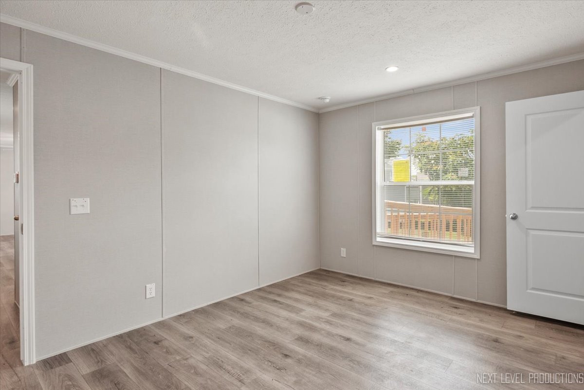 310 Apollo Court Round Lake, IL 60073 - Photo 12 of 38 a view of an empty room with a window