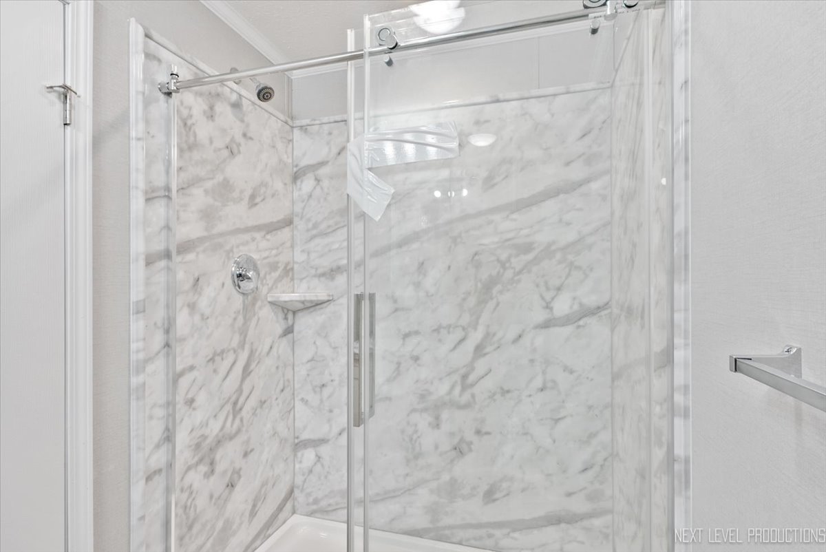 310 Apollo Court Round Lake, IL 60073 - Photo 20 of 38 a bathroom with a shower