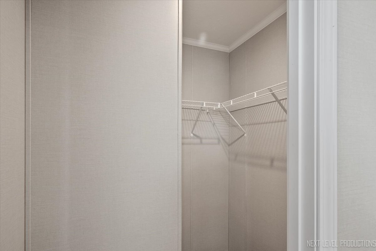 310 Apollo Court Round Lake, IL 60073 - Photo 23 of 38 a bathroom with a glass shower door