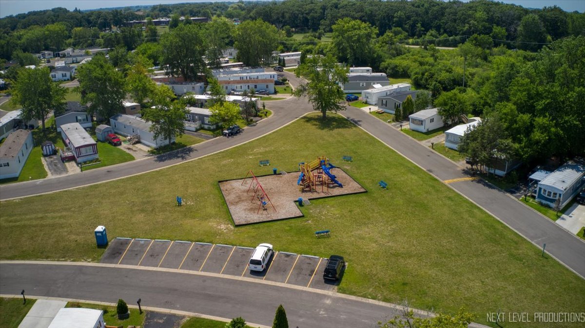 310 Apollo Court Round Lake, IL 60073 - Photo 25 of 38 a view of swimming pool from a balcony