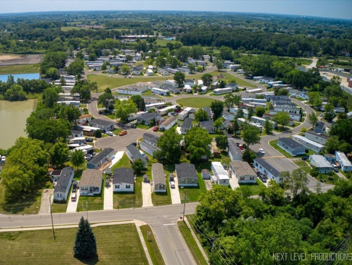 310 Apollo Court Round Lake, IL 60073 - Photo 27 of 38 an aerial view of residential houses with outdoor space and river