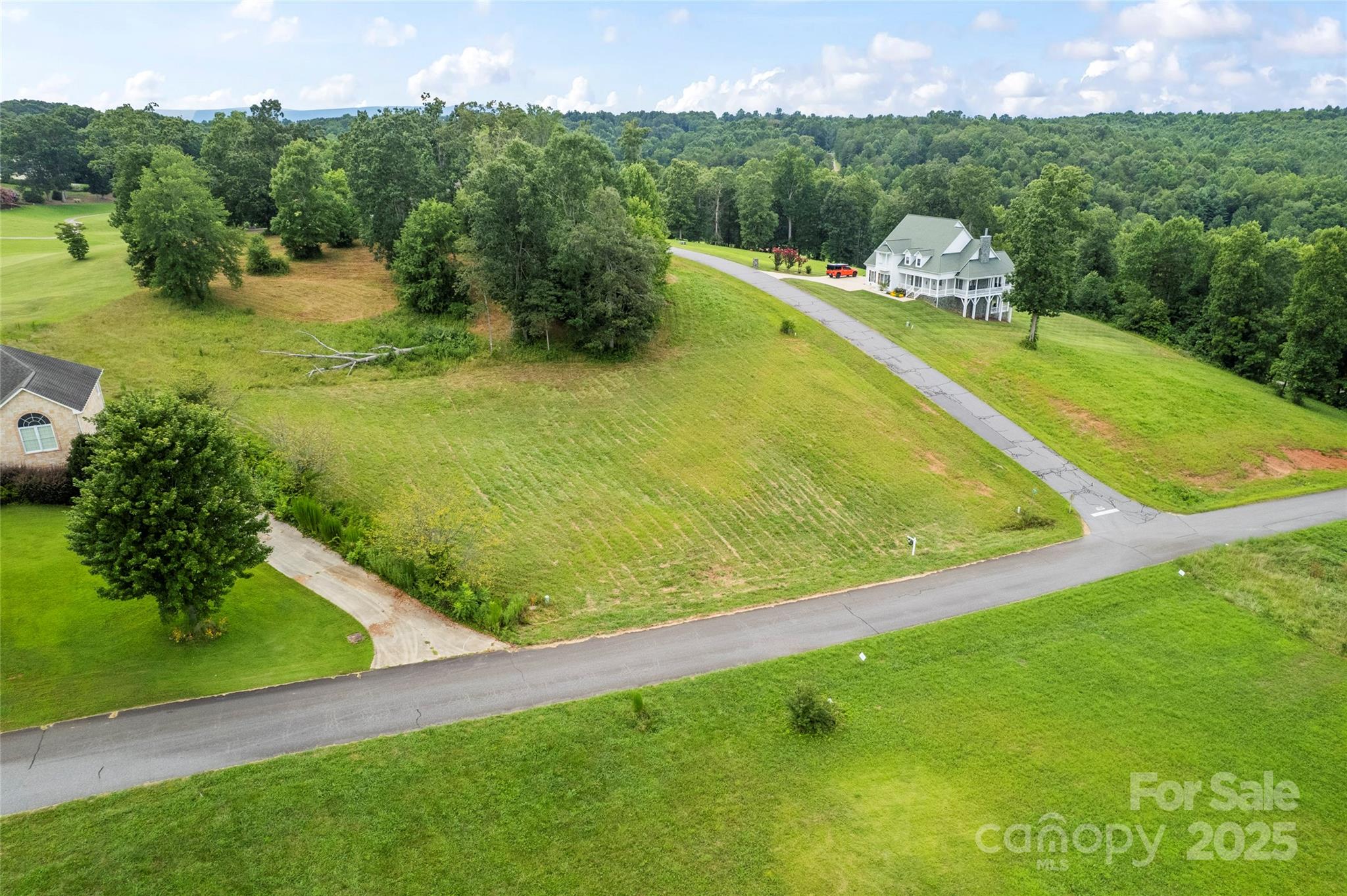 3615 Cornwell Court, Unit 149 Morganton, NC 28655 - Photo 1 of 20 a view of a swimming pool with a yard