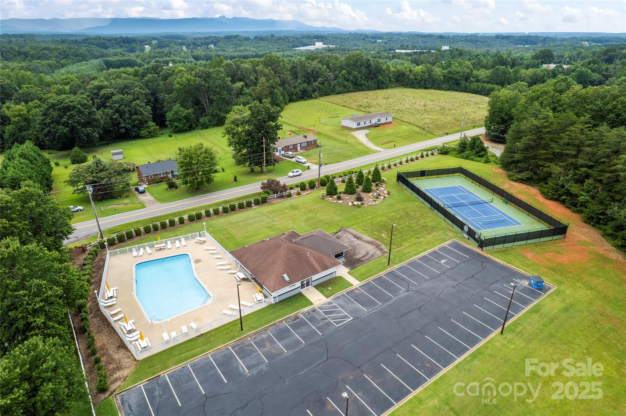 3615 Cornwell Court, Unit 149 Morganton, NC 28655 - Photo 17 of 20 an aerial view of a house with a garden